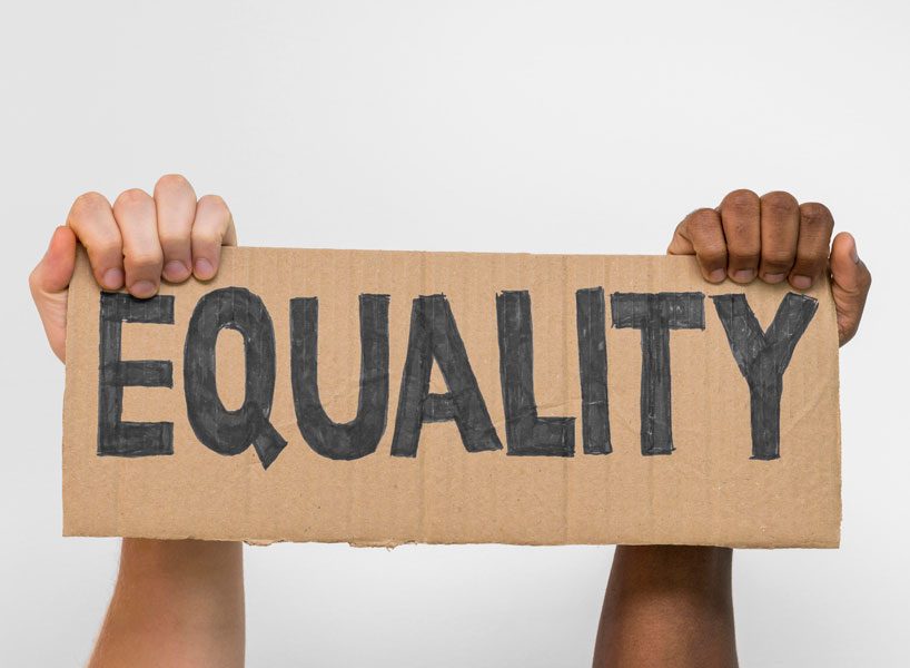 multiracial-hands-holding-cardboard-with-equality-thumbnail